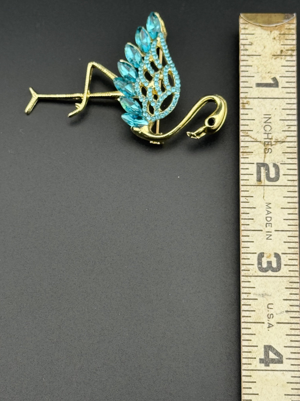 Gold Tone Flamingo Brooch with Blue Rhinestones