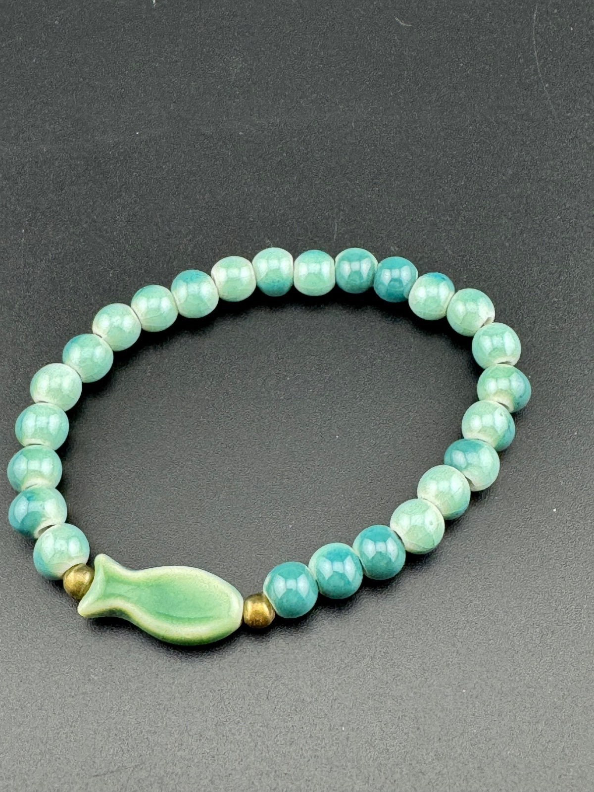 Handmade Green Beaded Stretch Bracelet with Fish Charm