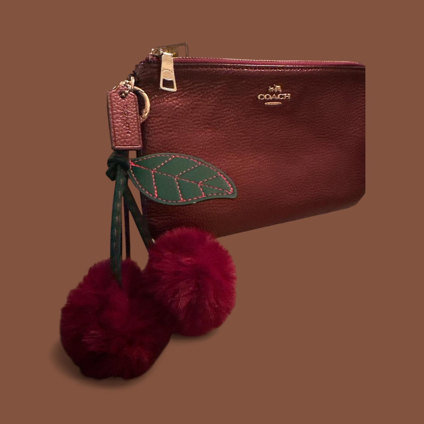 Coach Women's Leather Wristlet Clutch with Pom Pom Charm