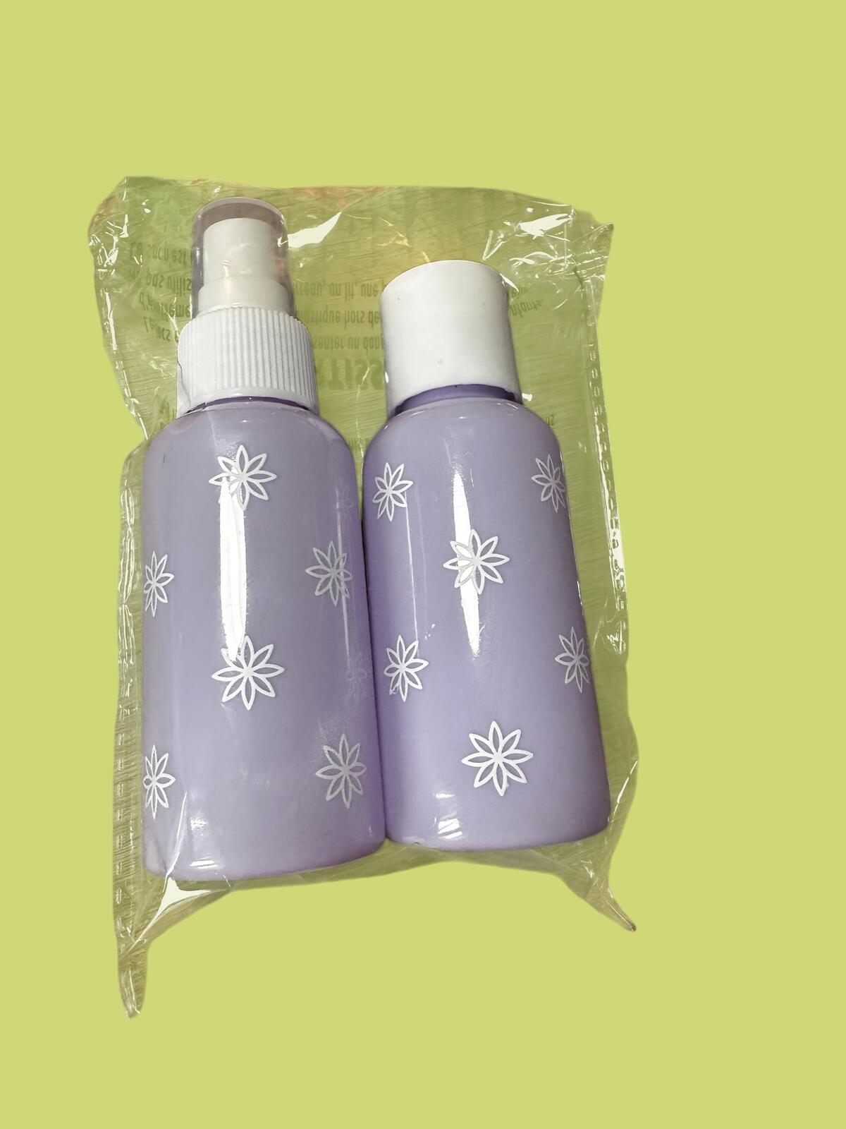 Clinique Heart Print Zip Cosmetic Pouch and Bottles