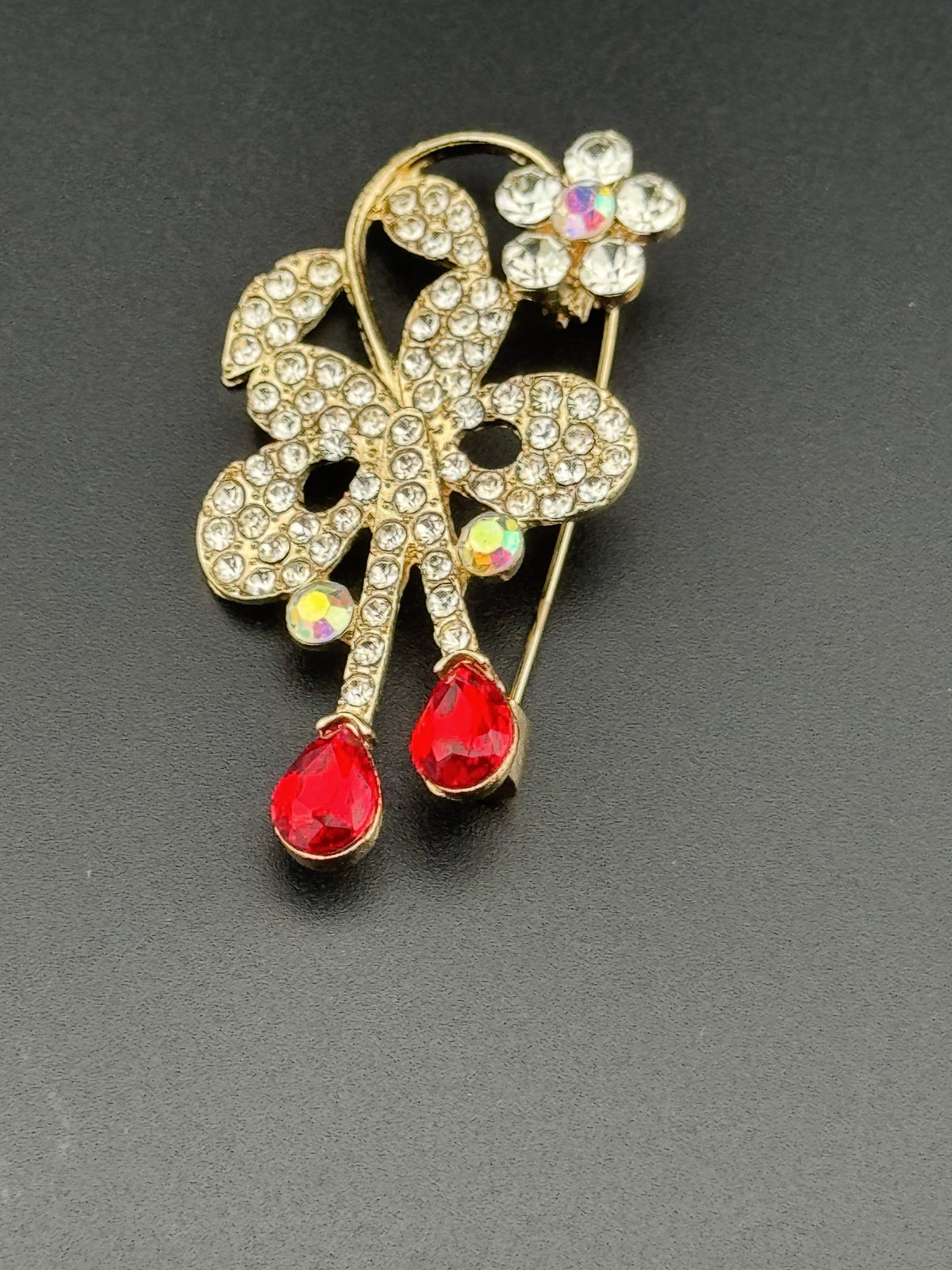 Gold Tone Floral Rhinestone Brooch with Red Teardrop