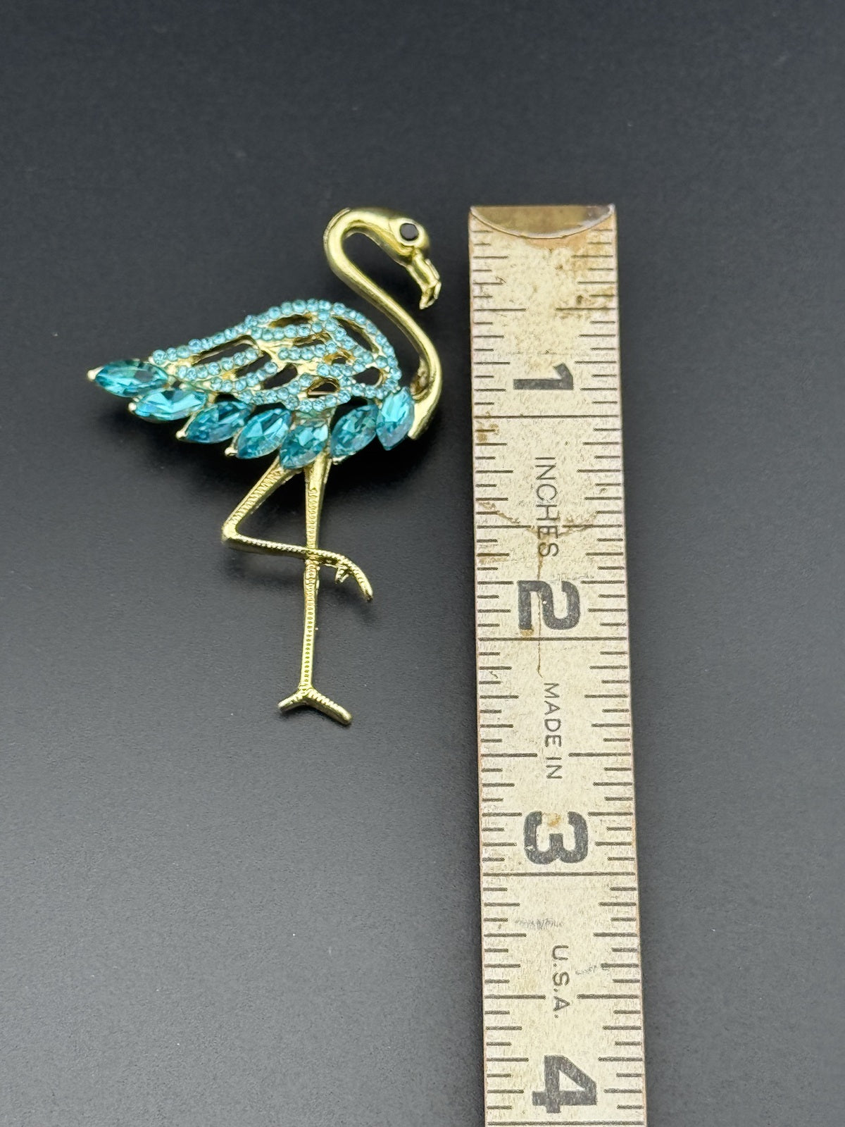 Gold Tone Flamingo Brooch with Blue Rhinestones
