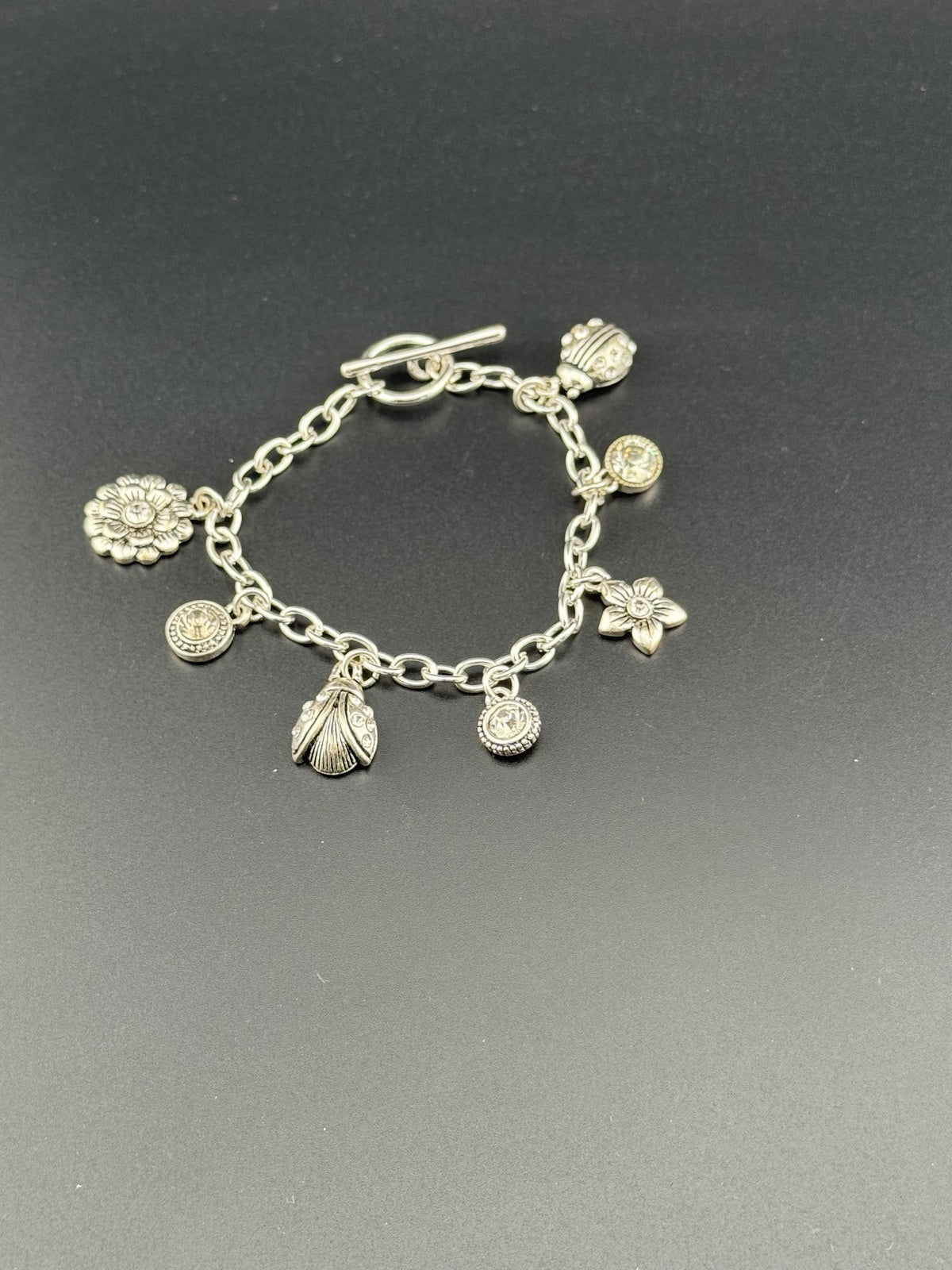 Silver Tone Charm Bracelet with Floral and Ladybug Charms