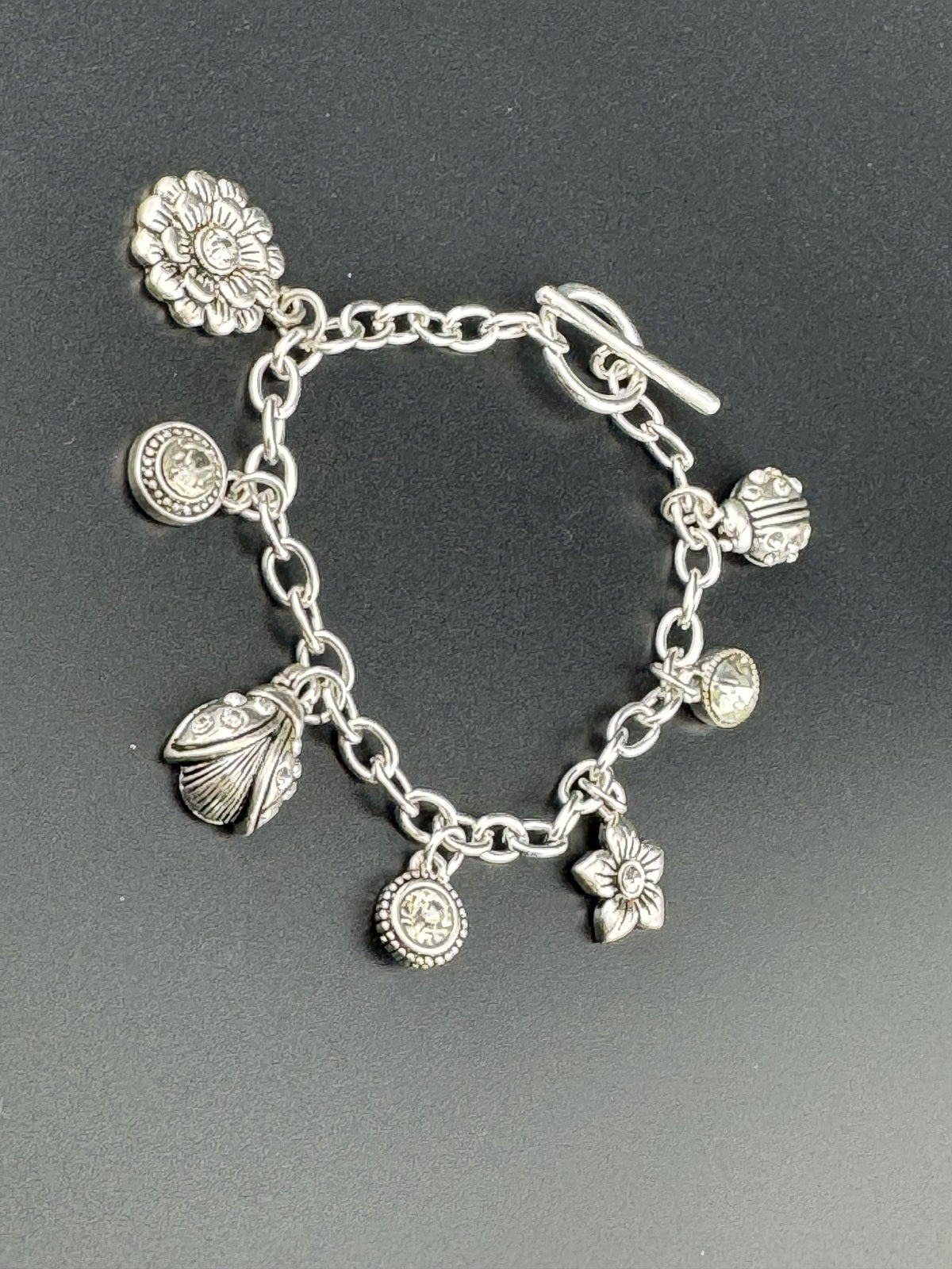 Silver Tone Charm Bracelet with Floral and Ladybug Charms