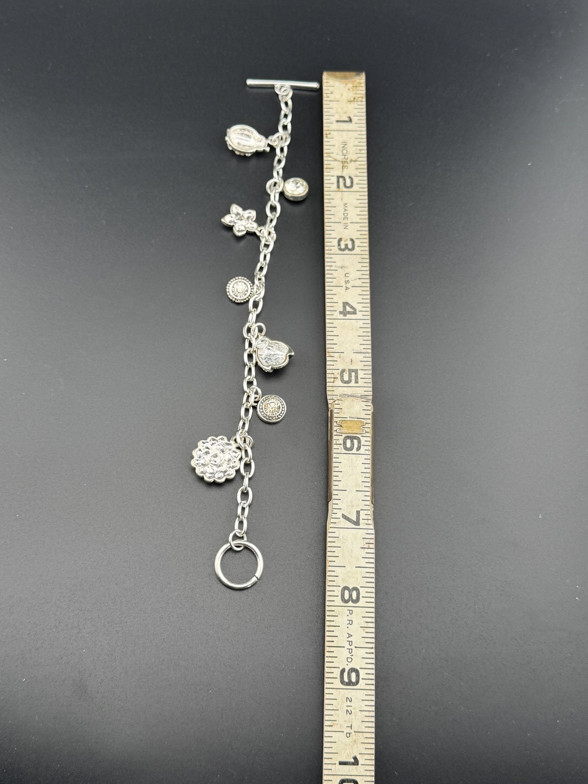 Silver Tone Charm Bracelet with Floral and Ladybug Charms