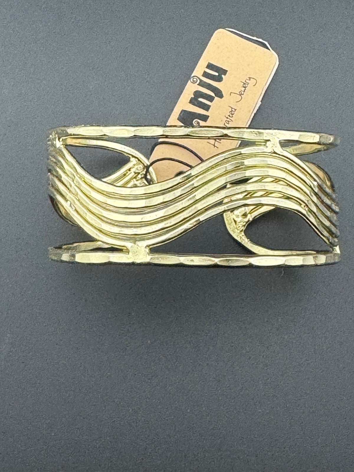 Gold Tone Open Cuff Bracelet with Wave Design