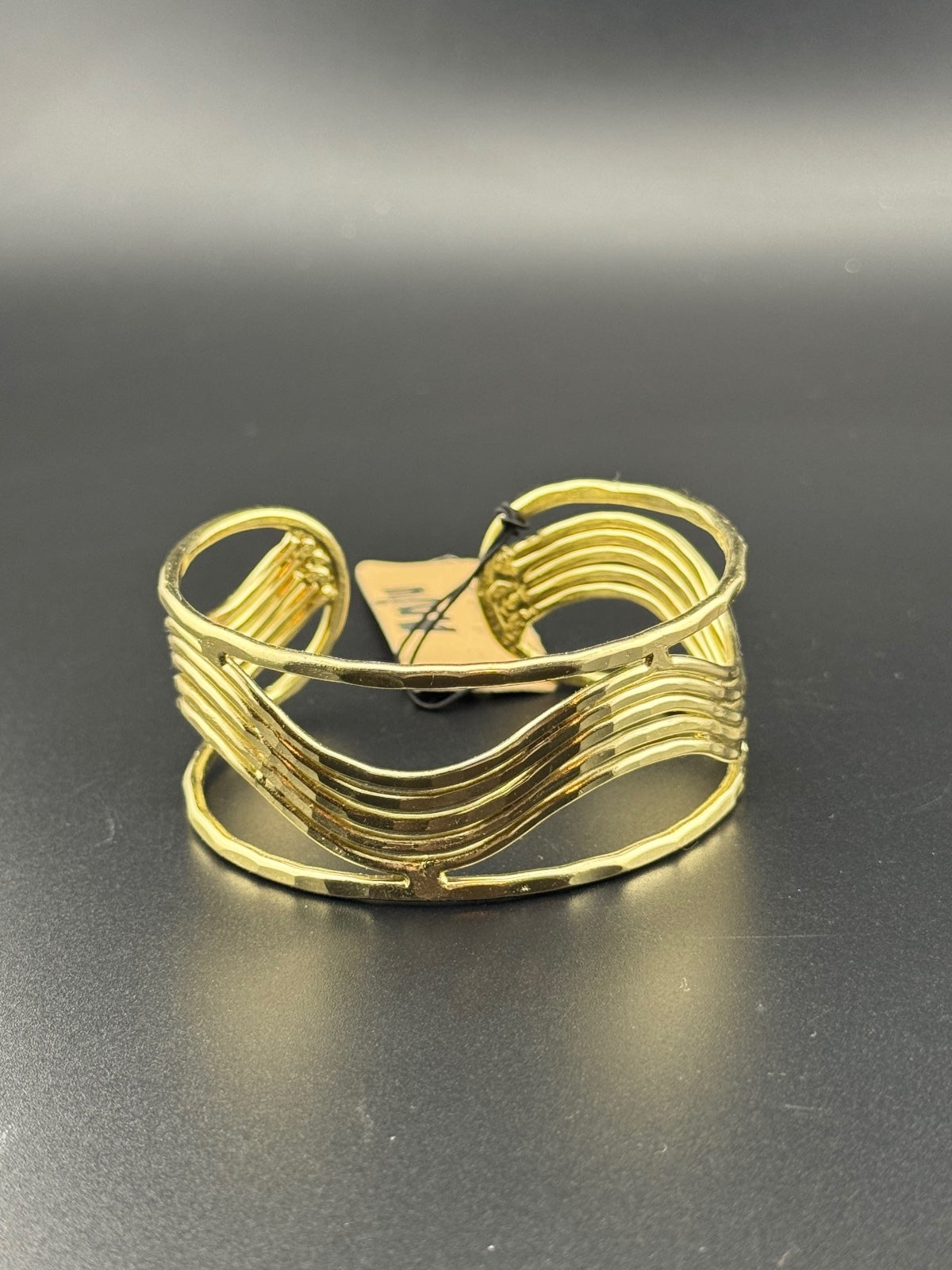 Gold Tone Open Cuff Bracelet with Wave Design