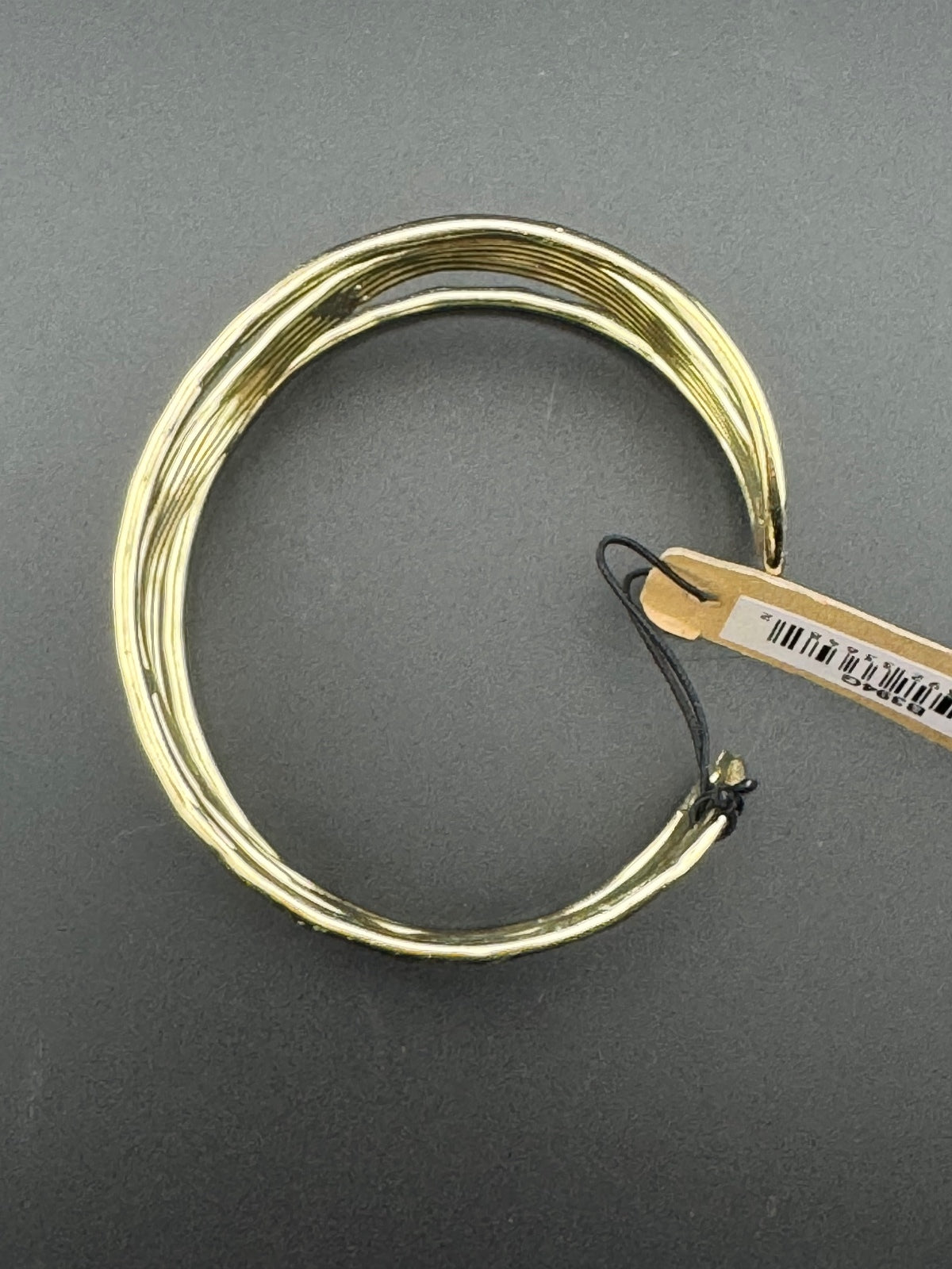 Gold Tone Open Cuff Bracelet with Wave Design