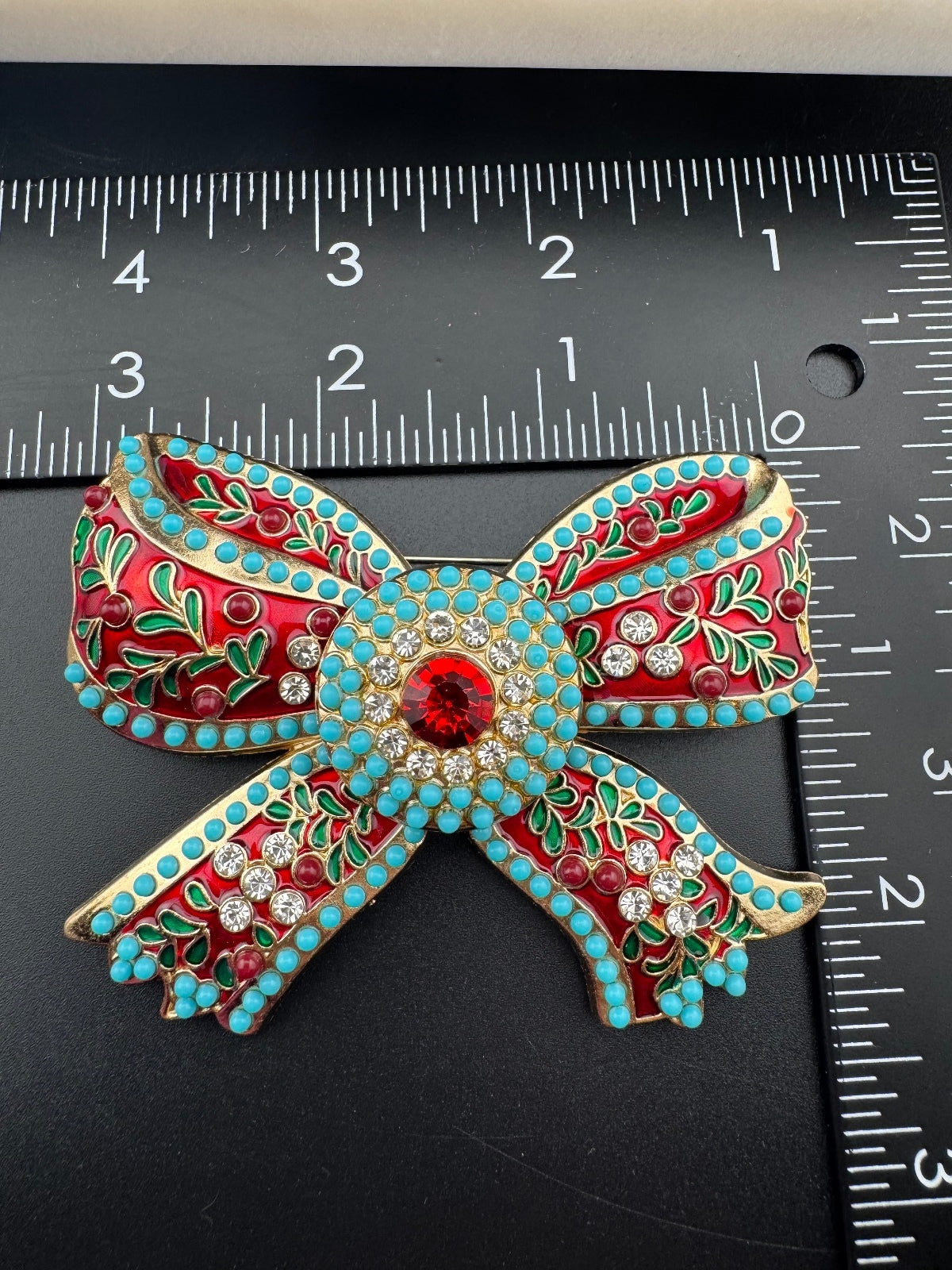 Decorative Bow Brooch with Red and Turquoise Accents