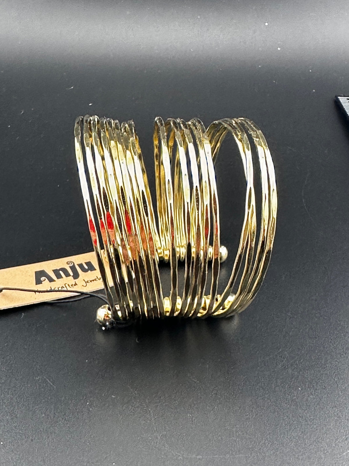 Anju Gold Tone Multi-Band Open Cuff Bracelet
