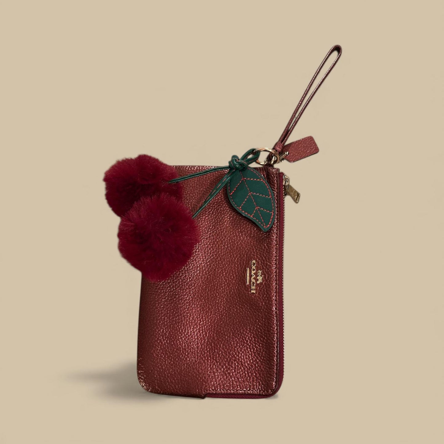 Coach Women's Leather Wristlet Clutch with Pom Pom Charm