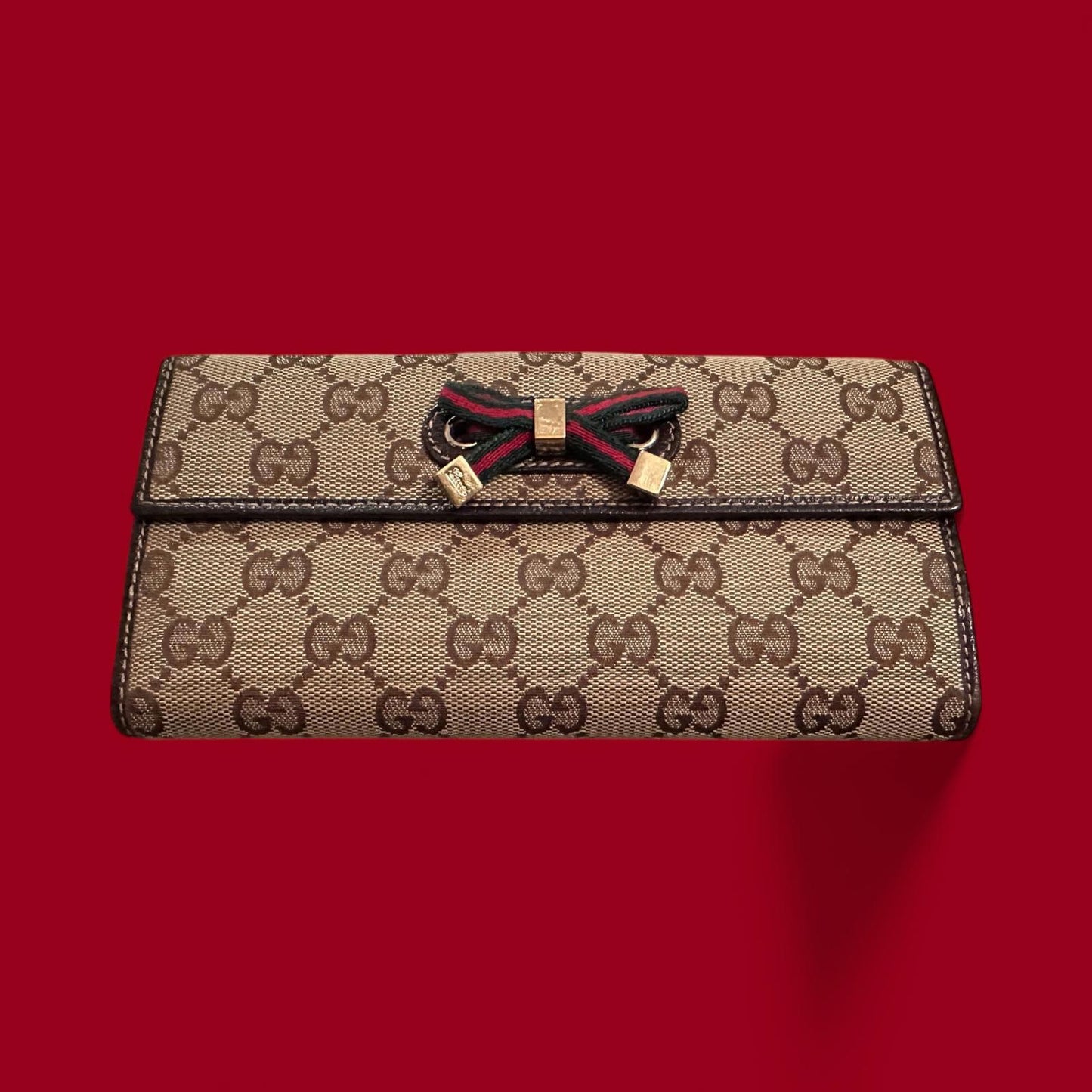 Gucci Women's Signature GG Canvas Wallet with Bow Accent