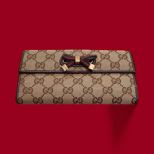 Gucci Women's Signature GG Canvas Wallet with Bow Accent